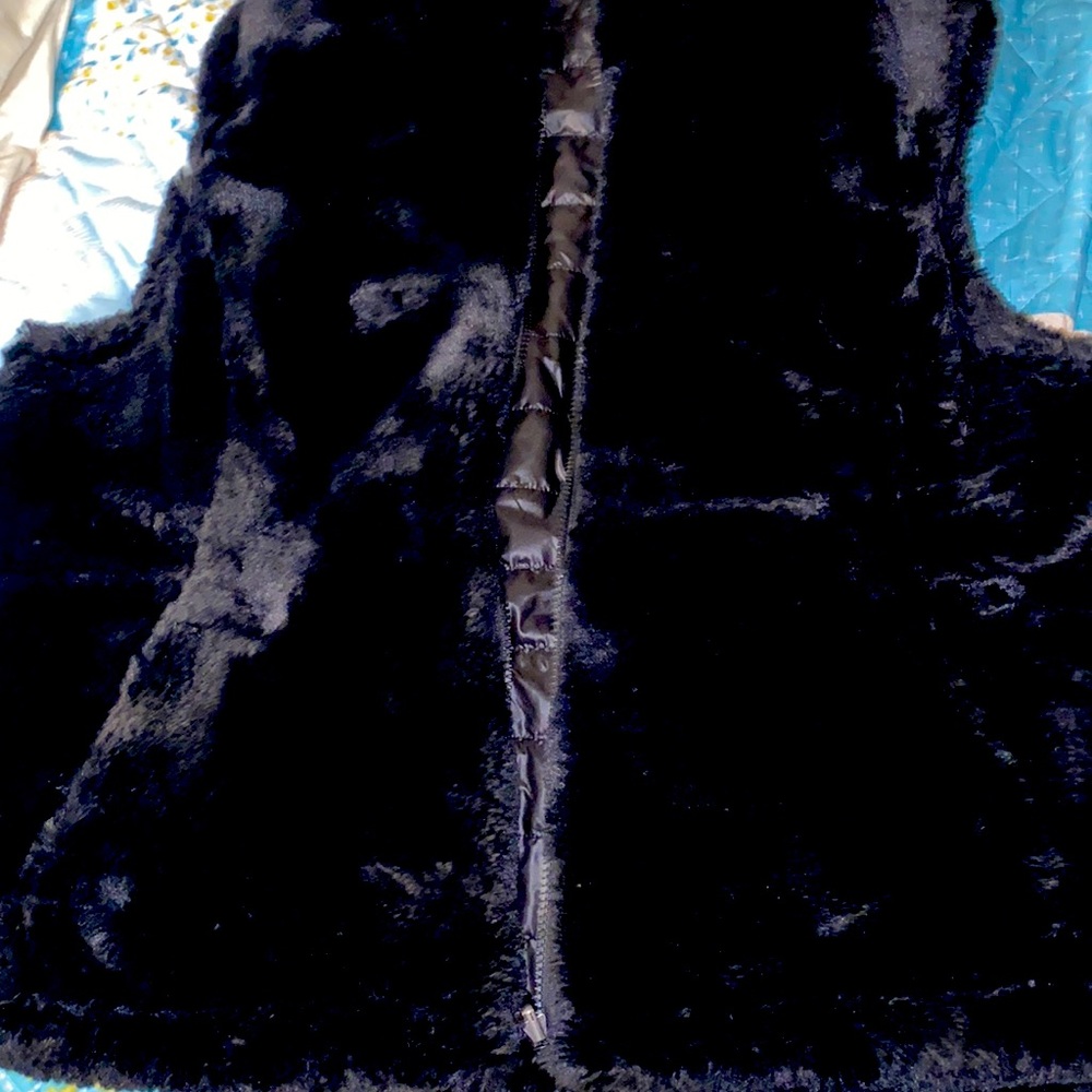 Black reversible vest